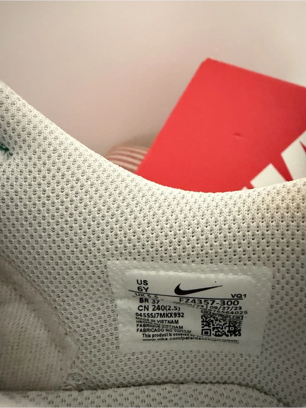 Nike Kids Low-Top Sneakers — White, Green & Red with Blue Swoosh